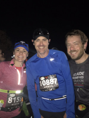 Elizabeth getting ready to run a marathon with her brother and brother-in-law.