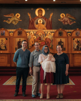At the baptism of our godson. We love being able to positively impact those around us.