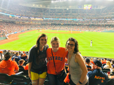 Enjoying a baseball game with friends.