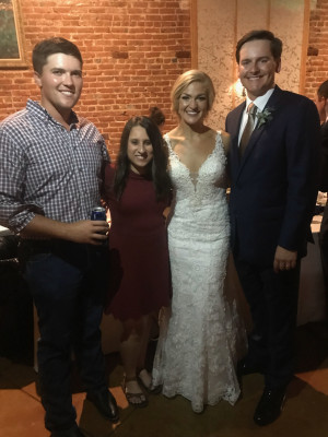 Kirsten's cousin that introduced them and his wife. Uncle Andy and Aunt Erin 