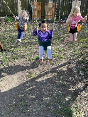 Swinging with my cousins!
