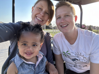 Enjoy the sun on a golf cart ride. 