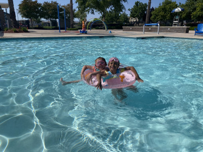 Best friends in a floatie