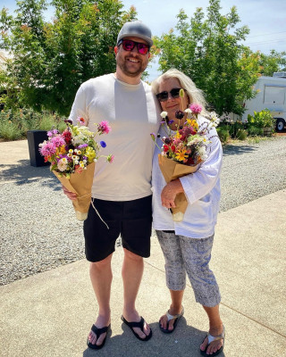 Mimmie and her “baby boy” at the flower farm