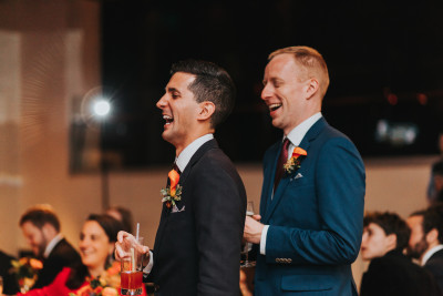 Laughing together at our wedding reception