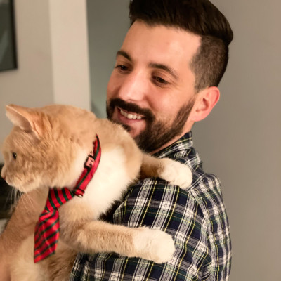 Our cat, Oliver, loves to be held