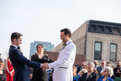 Jim and David with officiant, and David’s best friend, Kira 
