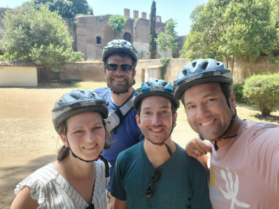 Biking in Rome, Italy with David's brother, Michael, and his wife, Jenn 