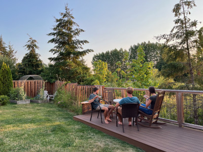 Our backyard has a garden in it and wetland area behind it